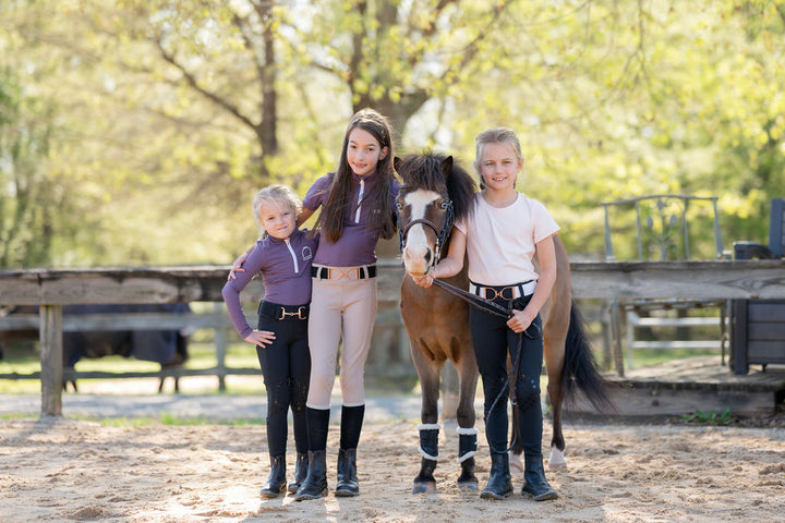 Kids Standing With Their Horse